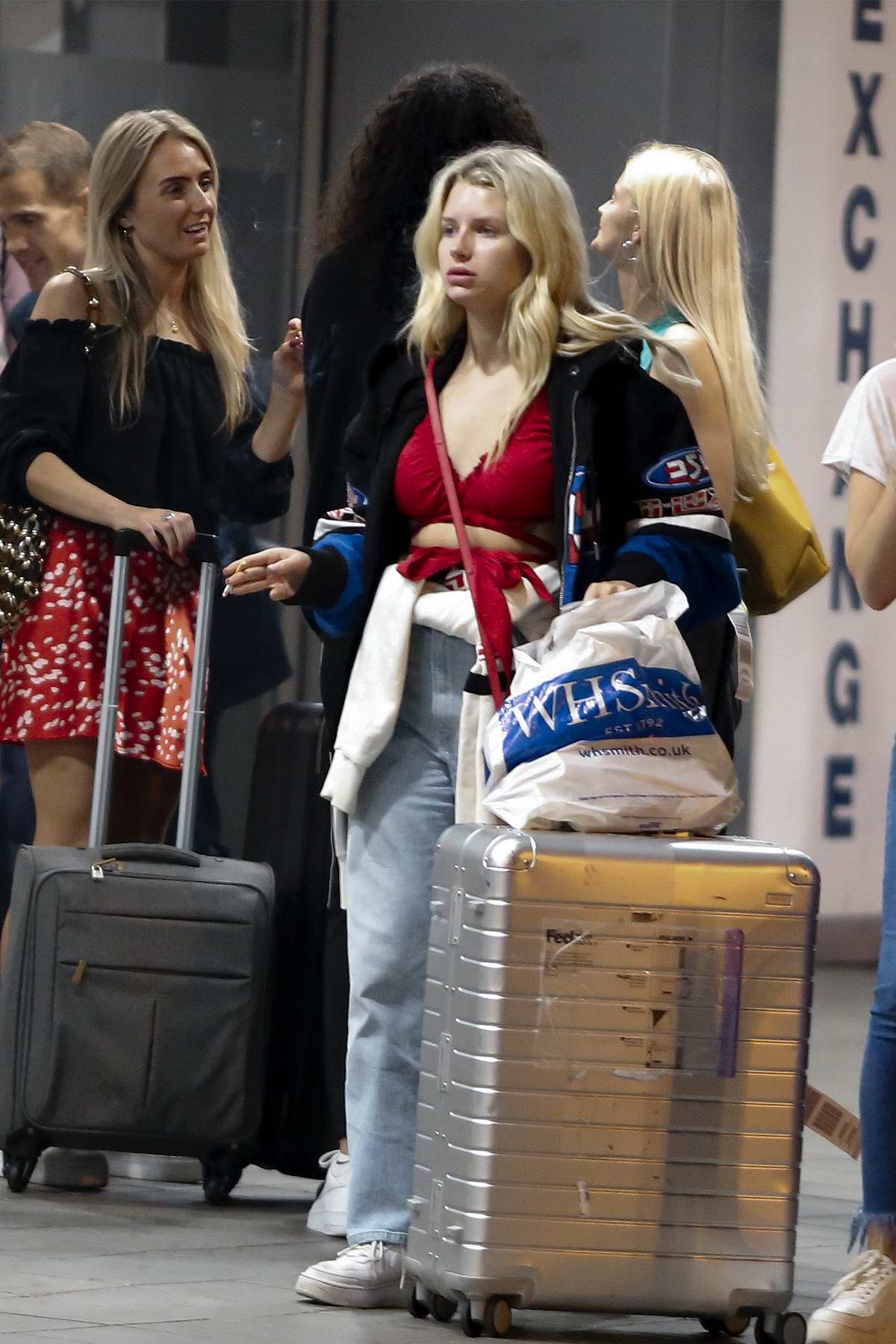 Lottie Moss grabs a quick smoke as she and her friends lands at Barcelona  airport , Spain