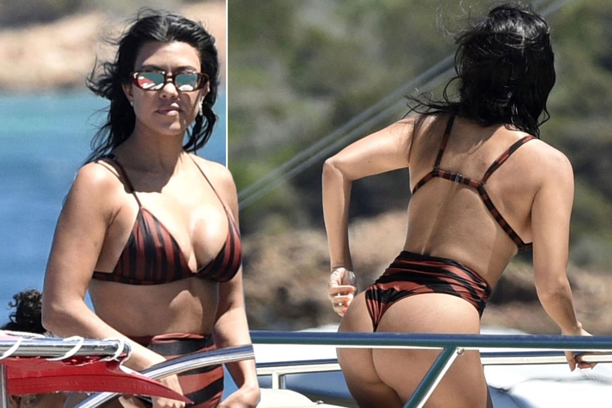 Kourtney Kardashian gets cheeky in striped bikini on vacation