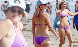 Ali Larter shows off her incredible figure in a lilac bikini in ...