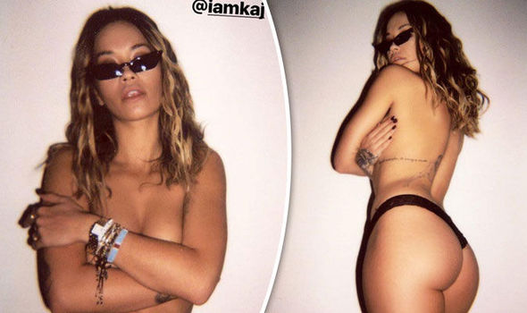 Rita Ora strips nearly NAKED as she flashes bottom in ...