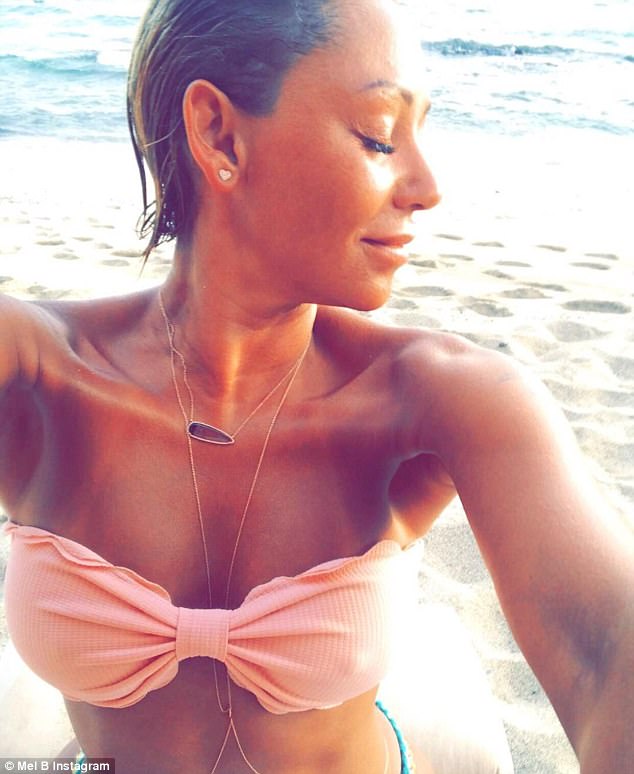Mel B channels debut album cover as she sizzles in Hawaii ...