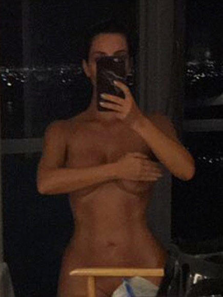 Kim Kardashian Celebrates Spray Tan With Nude Selfie