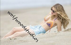 FAMOUS ACTRESS HALSTON SAGE SITTING IN SANDY ...