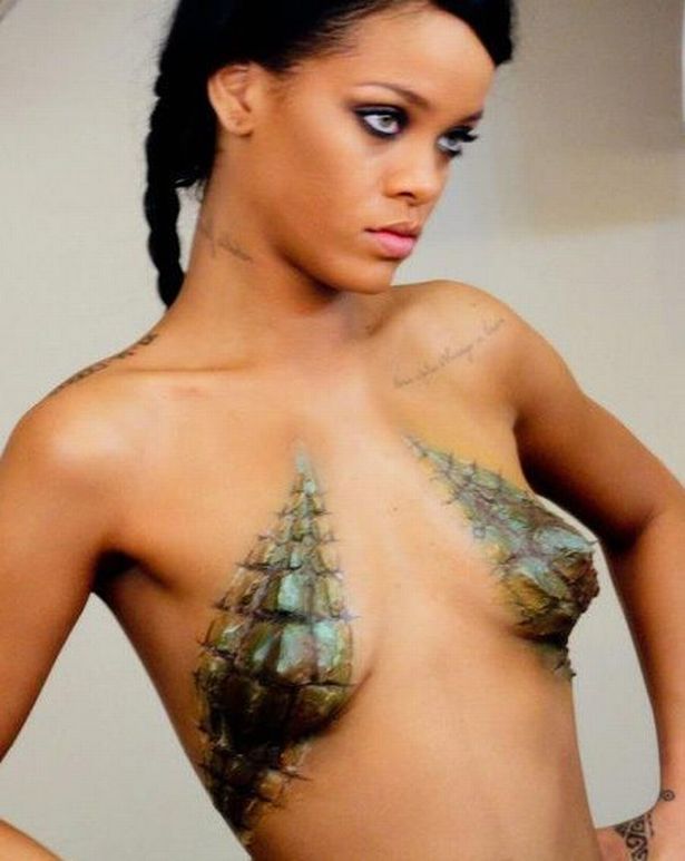 Rihanna gets boobs painted in croc skin, kicks back with ...