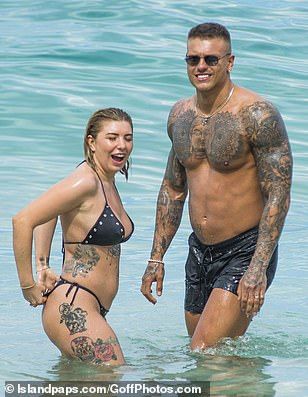 Olivia Buckland showcases her hourglass curves in Barbados ...