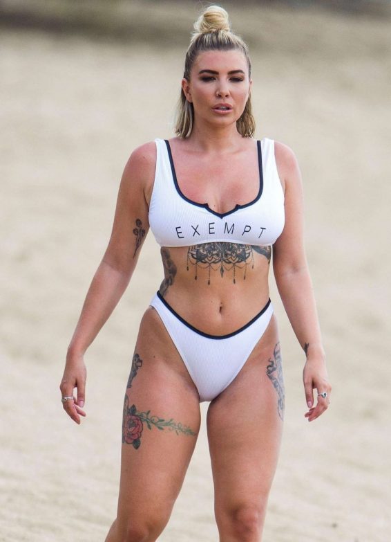 Olivia Buckland in White Bikini on the beach in Barbados ...