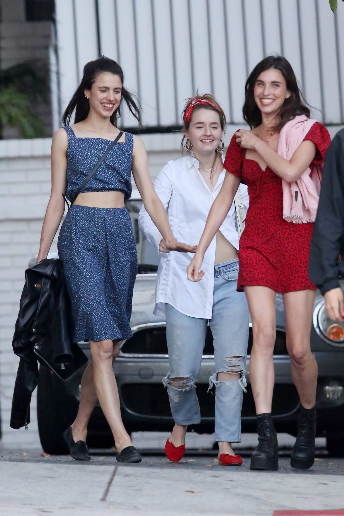 Margaret Qualley is all smiles as she heads out with Kaitlyn ...