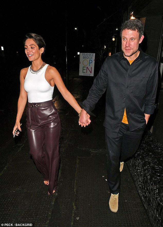 Frankie Bridge flashes a cheery smile as she steps out with ...