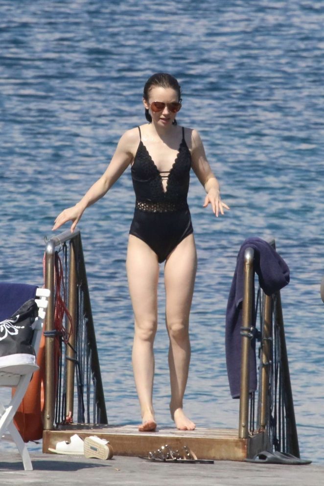 Lily Collins in Swimsuit at the beach in Italy | GotCeleb
