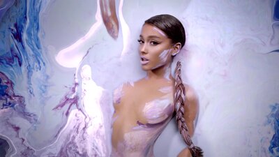 Ariana Grande Reposts Once-Deleted Painted Topless Photo ...
