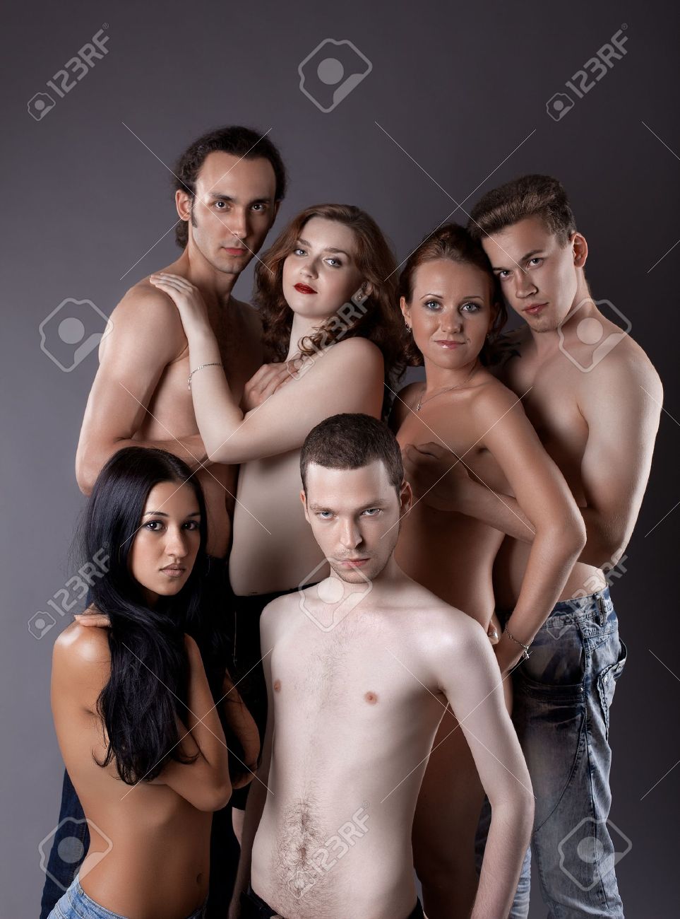 group of sexy half-nude people posing in jeans