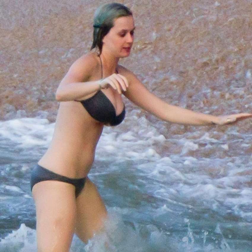 Katy Perry almost bursting out. : Celebs