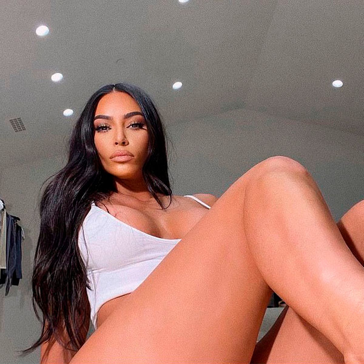 Kim Kardashian shows off incredible legs as she shares hot busty ...
