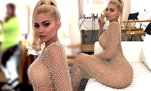 Kylie Jenner smolders in see-through gown as Kim Kardashian hints she is  overseeing Christmas card | Daily Mail Online