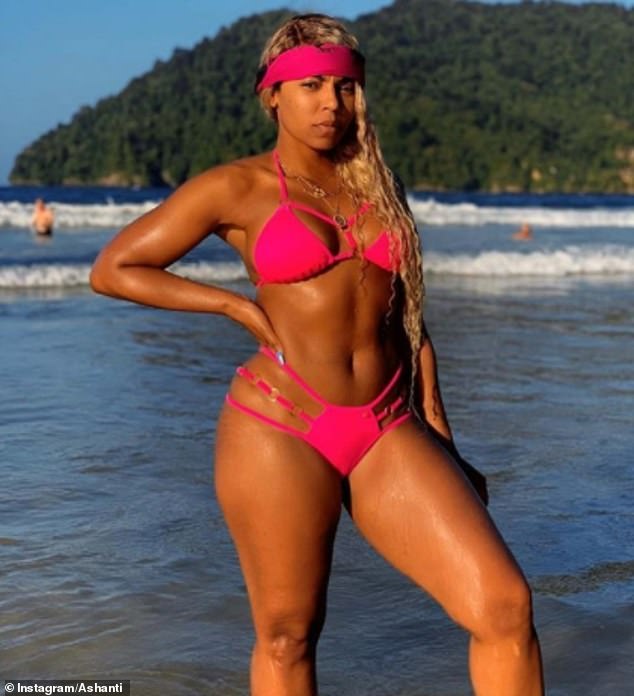 Ashanti flaunts her incredibly toned physique in hot pink bikini during  scenic Trinidad getaway | Daily Mail Online