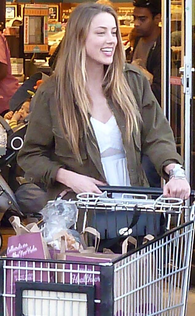 Amber Heard Flashes Her Massive Engagement Ring on Solo Shopping Trip - E!  Online